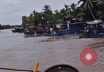 Immagine di Mobile forza fluviali barche in Vietnam Delta del Mekong Vietnam, 1968, secondo 60 filmato di repertorio 65675054294