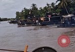 Immagine di Mobile forza fluviali barche in Vietnam Delta del Mekong Vietnam, 1968, secondo 61 filmato di repertorio 65675054294