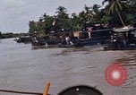 Immagine di Mobile forza fluviali barche in Vietnam Delta del Mekong Vietnam, 1968, secondo 62 filmato di repertorio 65675054294