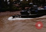 Standbild Mobile Riverine Kraft Boote Krieg in Vietnam Mekong Delta Vietnam, 1968, aus Sekunde 17 historischem Filmmaterial Videoclip 65675054295