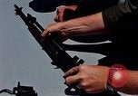 Immagine di Armi da fuoco Il Sud Est asiatico, 1966, secondo 13 filmato di repertorio 65675054299