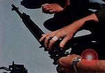 Immagine di Armi da fuoco Il Sud Est asiatico, 1966, secondo 14 filmato di repertorio 65675054299