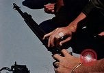 Immagine di Armi da fuoco Il Sud Est asiatico, 1966, secondo 18 filmato di repertorio 65675054299