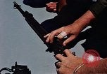 Immagine di Armi da fuoco Il Sud Est asiatico, 1966, secondo 19 filmato di repertorio 65675054299
