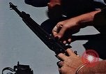 Immagine di Armi da fuoco Il Sud Est asiatico, 1966, secondo 20 filmato di repertorio 65675054299