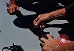 Immagine di Armi da fuoco Il Sud Est asiatico, 1966, secondo 21 filmato di repertorio 65675054299