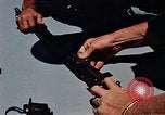 Immagine di Armi da fuoco Il Sud Est asiatico, 1966, secondo 22 filmato di repertorio 65675054299