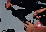 Immagine di Armi da fuoco Il Sud Est asiatico, 1966, secondo 23 filmato di repertorio 65675054299