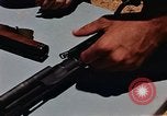 Immagine di Armi da fuoco Il Sud Est asiatico, 1966, secondo 44 filmato di repertorio 65675054299