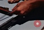 Immagine di Armi da fuoco Il Sud Est asiatico, 1966, secondo 45 filmato di repertorio 65675054299