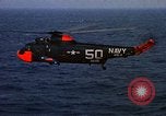 Image of helicopter SH-3A Caribbean Sea, 1965, second 23 stock footage video 65675054302