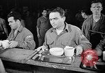 Image of Italian prisoners of war in mess line on USS Wasp (CV-18) Atlantic Ocean, 1945, second 1 stock footage video 65675054311