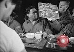 Image of Italian prisoners of war in mess line on USS Wasp (CV-18) Atlantic Ocean, 1945, second 5 stock footage video 65675054311