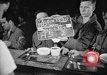 Image of Italian prisoners of war in mess line on USS Wasp (CV-18) Atlantic Ocean, 1945, second 6 stock footage video 65675054311
