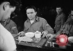 Image of Italian prisoners of war in mess line on USS Wasp (CV-18) Atlantic Ocean, 1945, second 9 stock footage video 65675054311