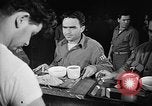Image of Italian prisoners of war in mess line on USS Wasp (CV-18) Atlantic Ocean, 1945, second 10 stock footage video 65675054311