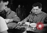 Image of Italian prisoners of war in mess line on USS Wasp (CV-18) Atlantic Ocean, 1945, second 14 stock footage video 65675054311