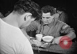 Image of Italian prisoners of war in mess line on USS Wasp (CV-18) Atlantic Ocean, 1945, second 16 stock footage video 65675054311