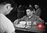 Image of Italian prisoners of war in mess line on USS Wasp (CV-18) Atlantic Ocean, 1945, second 22 stock footage video 65675054311
