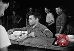 Image of Italian prisoners of war in mess line on USS Wasp (CV-18) Atlantic Ocean, 1945, second 23 stock footage video 65675054311