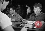Image of Italian prisoners of war in mess line on USS Wasp (CV-18) Atlantic Ocean, 1945, second 25 stock footage video 65675054311