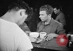 Image of Italian prisoners of war in mess line on USS Wasp (CV-18) Atlantic Ocean, 1945, second 27 stock footage video 65675054311