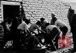 Image of French Marines unload small rail car Syria, 1916, second 7 stock footage video 65675054340
