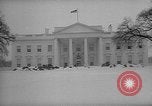 Image of snow covered Washington DC United States USA, 1966, second 40 stock footage video 65675054387