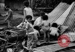 Standbild Stadt Dong Xoai ernsthaft in Angriff durch die Viet Cong beschädigt Dong Xoai Vietnam, 1965, aus Sekunde 42 historischem Filmmaterial Videoclip 65675054392