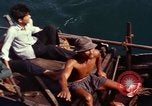 Image of junk boat Vietnam, 1965, second 35 stock footage video 65675054459