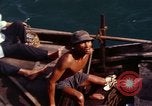 Image of junk boat Vietnam, 1965, second 36 stock footage video 65675054459