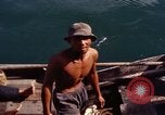 Image of junk boat Vietnam, 1965, second 38 stock footage video 65675054459