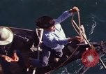 Image of junk boat Vietnam, 1965, second 56 stock footage video 65675054459
