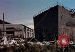 Image of damaged warehouses Yokohama Japan, 1945, second 26 stock footage video 65675054460