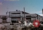 Image of damaged warehouses Yokohama Japan, 1945, second 39 stock footage video 65675054460
