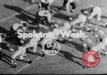 Image of football match Spokane Washington USA, 1953, second 1 stock footage video 65675054576