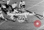 Image of football match Spokane Washington USA, 1953, second 3 stock footage video 65675054576
