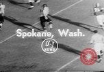 Image of football match Spokane Washington USA, 1953, second 4 stock footage video 65675054576