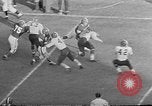 Image of football match Spokane Washington USA, 1953, second 50 stock footage video 65675054576
