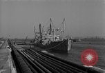 Image of Coast Guard cutter refueling Cherbourg Normandy France, 1944, second 3 stock footage video 65675054756