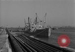 Image of Coast Guard cutter refueling Cherbourg Normandy France, 1944, second 4 stock footage video 65675054756