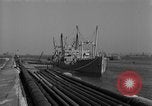 Image of Coast Guard cutter refueling Cherbourg Normandy France, 1944, second 8 stock footage video 65675054756