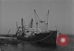 Image of Coast Guard cutter refueling Cherbourg Normandy France, 1944, second 10 stock footage video 65675054756