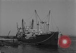 Image of Coast Guard cutter refueling Cherbourg Normandy France, 1944, second 11 stock footage video 65675054756