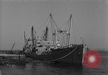 Image of Coast Guard cutter refueling Cherbourg Normandy France, 1944, second 12 stock footage video 65675054756