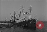 Image of Coast Guard cutter refueling Cherbourg Normandy France, 1944, second 14 stock footage video 65675054756