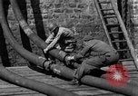 Image of Coast Guard cutter refueling Cherbourg Normandy France, 1944, second 29 stock footage video 65675054756