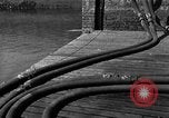 Image of Coast Guard cutter refueling Cherbourg Normandy France, 1944, second 31 stock footage video 65675054756