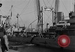 Image of Coast Guard cutter refueling Cherbourg Normandy France, 1944, second 52 stock footage video 65675054756