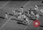 Immagine di 1964 Michigan versus Perdue gioco di calcio Ann Arbor Michigan USA, 1964, secondo 14 filmato di repertorio 65675054840